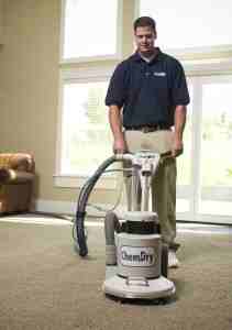 Carpet cleaning professionals use green-certified solutions for deeper carpet cleaning - image